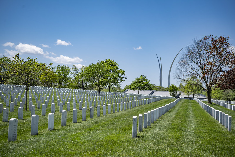 The Air Force Memorial soars above Section 69 of Arlington National Cemetery. 
