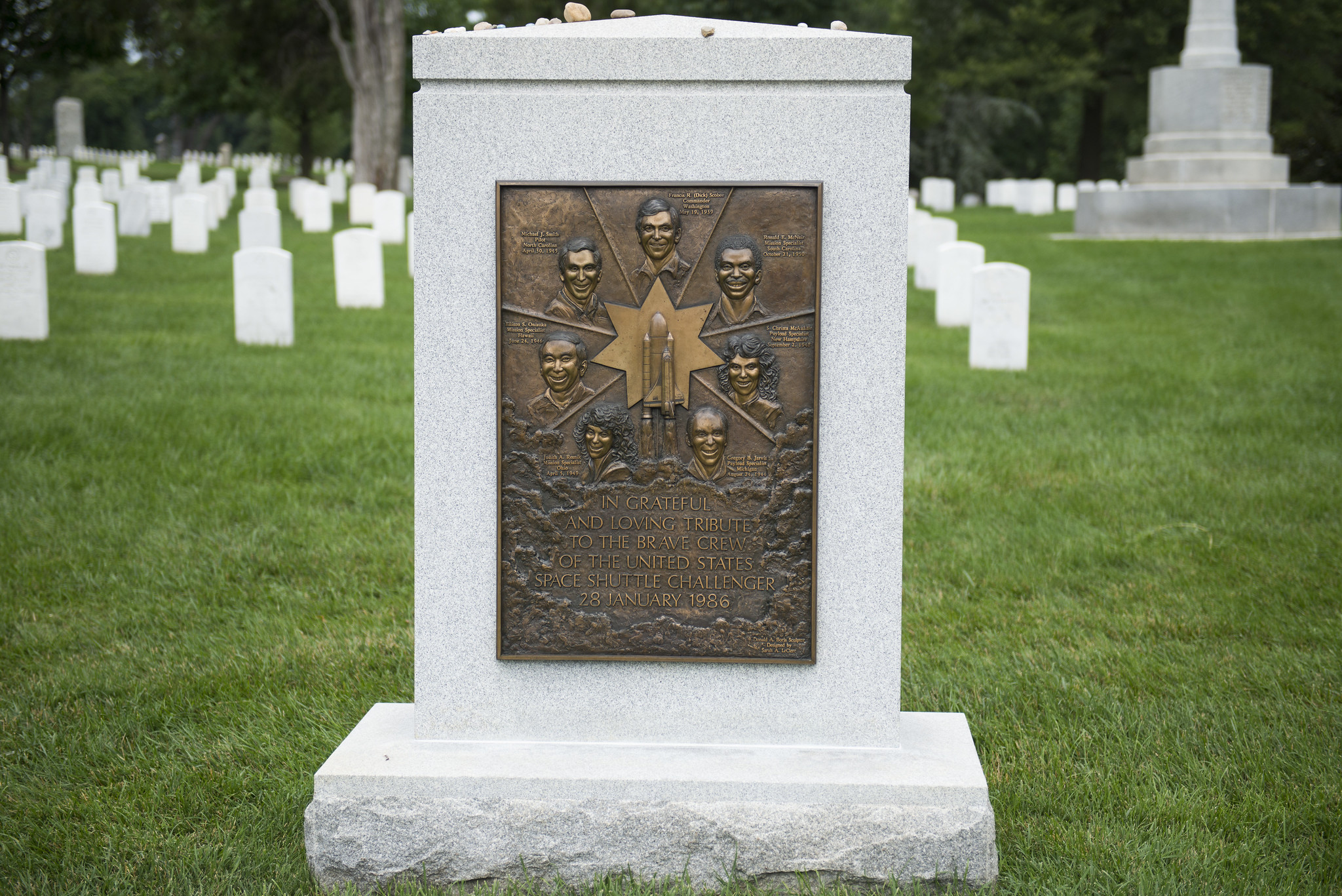 the Challenger memorial, with the faces and names of the seven astronauts who lost their lives in the 1986 explosion the Challenger memorial, with the faces and names of the seven astronauts who lost their lives in the 1986 explosion